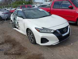 2020 Nissan Maxima SL z VIN 1N4AA6DV4LC379314, wystawiony jako IAAI lot #41868509 z przebiegiem 18 107 mil mil oraz . Historia ofert i sprzedaży dostępna na DreamBid. Obrazek 1.
