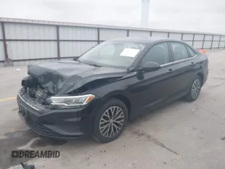 2021 Volkswagen Jetta S z VIN 3VWC57BU5MM008733, wystawiony jako IAAI lot #42527371 z przebiegiem 76 548 mil mil oraz . Historia ofert i sprzedaży dostępna na DreamBid. Obrazek 2.