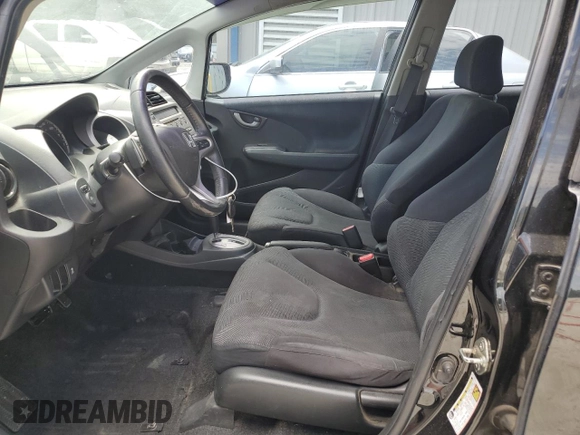 2011 Honda Fit Sport z VIN JHMGE8H51BC015640, wystawiony jako Copart lot #57870555 z przebiegiem 179 497 mil mil oraz Szkoda całkowita • Salvage title. Historia ofert i sprzedaży dostępna na DreamBid. Obrazek 7.