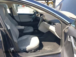 2013 Tesla Model S with VIN 5YJSA1CNXDFP06077, listed as a IAAI auction lot 41958105 with 84,773 mi miles. Bid and sale history available at carsss.com. Image 5.