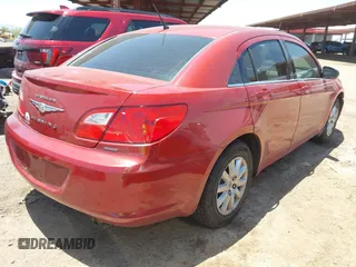 2010 Chrysler Sebring Touring z VIN 1C3CC4FB2AN146011, wystawiony jako IAAI lot #42379595 z przebiegiem 73 179 mil mil oraz . Historia ofert i sprzedaży dostępna na DreamBid. Obrazek 4.