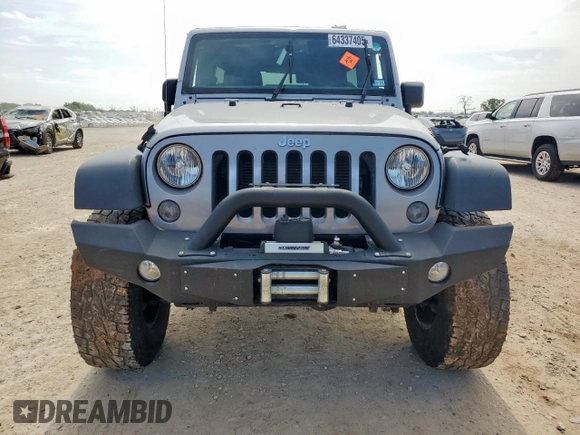 2015 Jeep Wrangler Unlimited Rubicon z VIN 1C4BJWFG0FL529310, wystawiony jako Copart lot #64337405 z przebiegiem Nie podano mil oraz Szkoda całkowita • Salvage title. Historia ofert i sprzedaży dostępna na DreamBid. Obrazek 5.