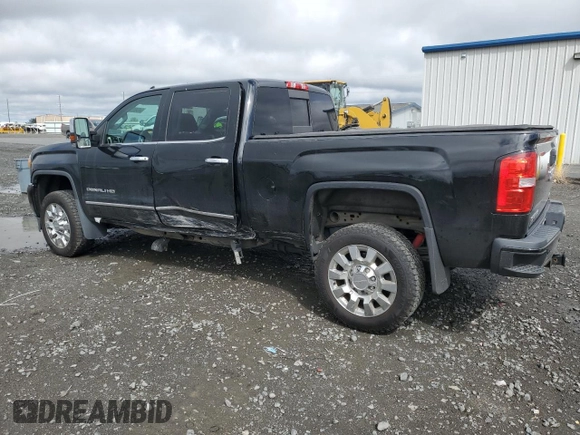 2017 GMC Sierra 2500HD Denali z VIN 1GT12UEY0HF114366, wystawiony jako Copart lot #54540275 z przebiegiem 78 066 mil mil oraz Szkoda całkowita • Salvage title. Historia ofert i sprzedaży dostępna na DreamBid. Obrazek 2.