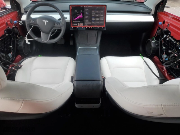 2021 Tesla Model 3 Standard Range Plus with VIN 5YJ3E1EA8MF978257, listed as a Copart auction lot 48592605 with 84,710 mi miles and Salvage Title. Bid and sale history available at carsss.com. Image 8.