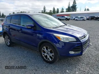 2013 Ford Escape SEL with VIN 1FMCU9H94DUC94540, listed as a IAAI auction lot 42649595 with 139,840 mi miles and . Bid and sale history available at DreamBid. Image 1.