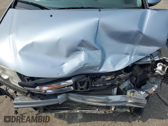 2014 Honda Odyssey Touring with VIN 5FNRL5H95EB080449, listed as a Copart auction lot 58489715 with 154,604 mi miles and Salvage title. Bid and sale history available at DreamBid. Image 12.