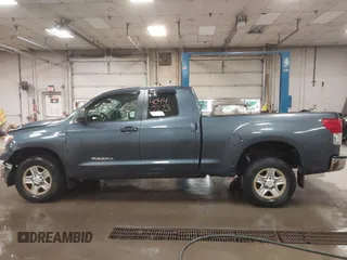 2010 Toyota Tundra 4WD Truck with VIN 5TFUM5F16AX006879, listed as a IAAI auction lot 40447273 with 219,498 mi miles. Bid and sale history available at carsss.com. Image 14.