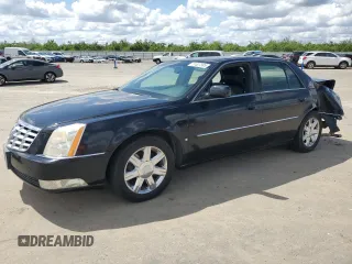 2006 Cadillac DTS 1SC z VIN 1G6KD57Y46U111435, wystawiony jako Copart lot #51827595 z przebiegiem 65 728 mil mil oraz Szkoda całkowita • Salvage title. Historia ofert i sprzedaży dostępna na DreamBid. Obrazek 1.