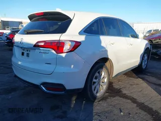 2018 Acura RDX with VIN 5J8TB4H37JL024729, listed as a IAAI auction lot 41247986 with 107,456 mi miles. Bid and sale history available at carsss.com. Image 4.