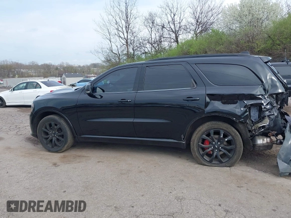 2019 Dodge Durango GT Plus with VIN 1C4RDJDG6KC561099, listed as a IAAI auction lot 41963187 with 104,153 mi miles and . Bid and sale history available at DreamBid. Image 15.