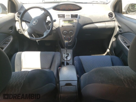 2009 Toyota Yaris z VIN JTDBT903191307764, wystawiony jako Copart lot #53498945 z przebiegiem 212 530 mil mil oraz Szkody całkowita. Historia ofert i sprzedaży dostępna na DreamBid. Obrazek 8.