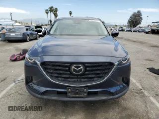 2023 Mazda CX-9 Touring Plus with VIN JM3TCBAY1P0649490, listed as a Copart auction lot 52217915 with 20,716 mi miles and Salvage title. Bid and sale history available at DreamBid. Image 5.