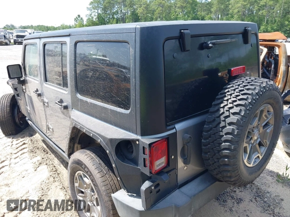 2016 Jeep Wrangler Unlimited Rubicon Hard Rock with VIN 1C4BJWFG6GL265320, listed as a IAAI auction lot 42260151 with Not provided miles and . Bid and sale history available at DreamBid. Image 3.