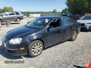 2010 Volkswagen Jetta S with VIN 3VWJZ7AJ1AM032185, listed as a Copart auction lot 58562615 with 189,752 mi miles and Salvage title. Bid and sale history available at DreamBid. Image 1.