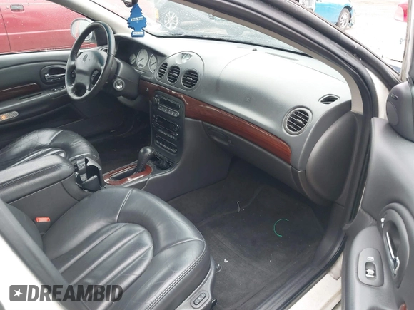 2000 Chrysler LHS with VIN 2C3HC56G4YH382301, listed as a IAAI auction lot 41324699 with 220,076 mi miles and . Bid and sale history available at DreamBid. Image 5.