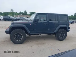2016 Jeep Wrangler Unlimited Rubicon with VIN 1C4HJWFG6GL346862, listed as a IAAI auction lot 42441610 with 94,227 mi miles and . Bid and sale history available at DreamBid. Image 14.