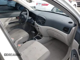 2006 Hyundai Accent GLS with VIN KMHCN46C36U009036, listed as a IAAI auction lot 41705369 with 134,328 mi miles. Bid and sale history available at carsss.com. Image 5.