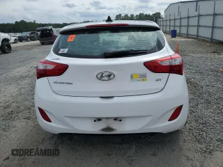 2013 Hyundai Elantra GT with VIN KMHD35LE0DU121960, listed as a Copart auction lot 71340194 with 148,280 mi miles and Salvage Title. Bid and sale history available at carsss.com. Image 6.