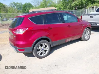 2013 Ford Escape SEL with VIN 1FMCU9H91DUD65144, listed as a IAAI auction lot 42124589 with 221,631 mi miles and . Bid and sale history available at DreamBid. Image 4.