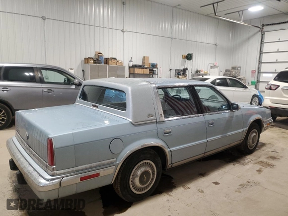 1989 Chrysler New Yorker z VIN 1C3BC663XKD578434, wystawiony jako Copart lot #84945044 z przebiegiem 51 067 mil mil oraz Szkody całkowita. Historia ofert i sprzedaży dostępna na DreamBid. Obrazek 3.