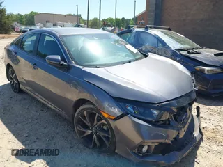 2019 Honda Civic Sport with VIN 19XFC2F88KE028035, listed as a IAAI auction lot 42000936 with 51,666 mi miles and . Bid and sale history available at DreamBid. Image 1.