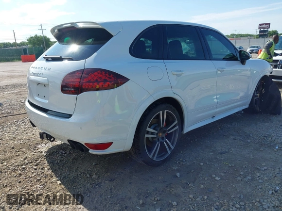 2013 Porsche Cayenne GTS with VIN WP1AD2A25DLA77759, listed as a IAAI auction lot 42316241 with 212,034 mi miles and . Bid and sale history available at DreamBid. Image 4.