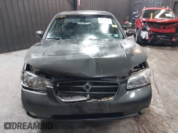 2001 Nissan Maxima SE with VIN JN1CA31A91T112866, listed as a IAAI auction lot 42372546 with 156,069 mi miles and . Bid and sale history available at DreamBid. Image 6.