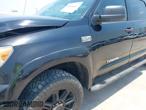 2013 Toyota Tundra z VIN 5TFDW5F15DX321719, wystawiony jako IAAI lot #42269647 z przebiegiem 174 242 mil mil oraz . Historia ofert i sprzedaży dostępna na DreamBid. Obrazek 18.