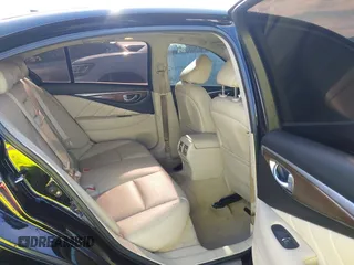 2014 Infiniti Q50 Premium with VIN JN1BV7AP0EM687787, listed as a IAAI auction lot 42084288 with 109,499 mi miles and . Bid and sale history available at carsss.com. Image 8.