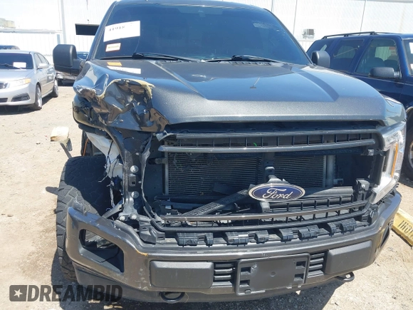 2020 Ford F-150 XL with VIN 1FTEW1E50LKE93170, listed as a IAAI auction lot 41918973 with 99,117 mi miles and . Bid and sale history available at carsss.com. Image 17.