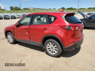 2016 Mazda CX-5 Sport with VIN JM3KE4BYXG0702655, listed as a Copart auction lot 63120205 with 64,403 mi miles and Salvage title. Bid and sale history available at DreamBid. Image 2.