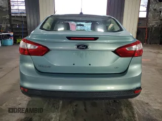 2012 Ford Focus SE with VIN 1FAHP3F27CL149328, listed as a Copart auction lot 56000325 with 147,097 mi miles and Salvage Title. Bid and sale history available at DreamBid. Image 6.
