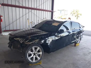 2014 Cadillac ATS Standard RWD with VIN 1G6AA5RX3E0159300, listed as a IAAI auction lot 40271449 with 124,125 mi miles. Bid and sale history available at carsss.com. Image 2.