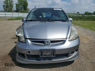 2007 Honda Fit Sport with VIN JHMGD38687S067648, listed as a Copart auction lot 64657345 with 123,055 mi miles and Salvage title. Bid and sale history available at DreamBid. Image 5.