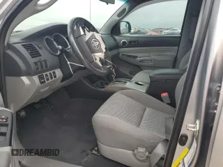 2014 Toyota Tacoma with VIN 3TMMU4FN0EM072840, listed as a Copart auction lot 51740805 with 128,678 mi miles and Salvage title. Bid and sale history available at DreamBid. Image 7.