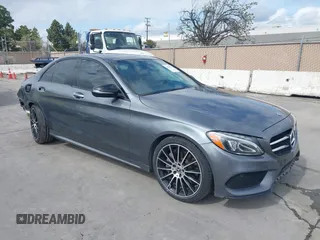 2018 Mercedes-Benz C with VIN 55SWF4JB2JU253953, listed as a IAAI auction lot 41915057 with 84,897 mi miles. Bid and sale history available at carsss.com. Image 1.