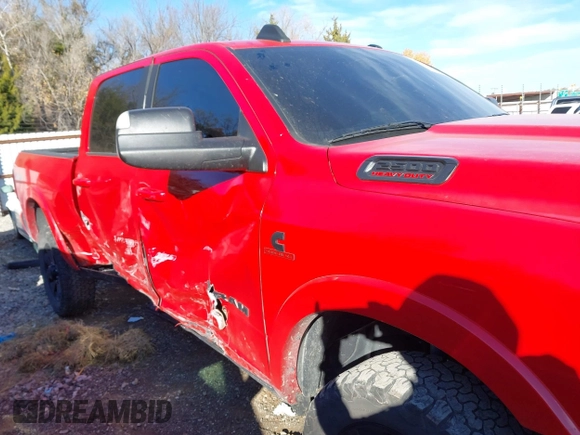 2020 Ram 2500 Laramie z VIN 3C6UR5FL5LG167208, wystawiony jako IAAI lot #41035465 z przebiegiem 206 427 mil mil oraz . Historia ofert i sprzedaży dostępna na DreamBid. Obrazek 6.