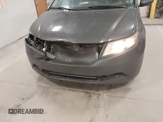 2015 Honda Odyssey EX-L with VIN 5FNRL5H64FB055890, listed as a IAAI auction lot 41706141 with 155,167 mi miles and . Bid and sale history available at carsss.com. Image 12.