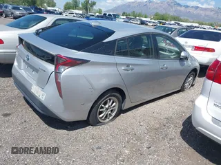 2018 Toyota Prius Two with VIN JTDKBRFU3J3068097, listed as a IAAI auction lot 42178684 with 335,391 mi miles and . Bid and sale history available at DreamBid. Image 4.