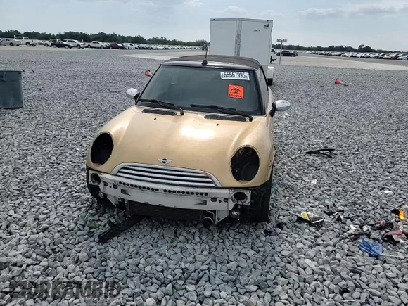 2005 MINI Convertible with VIN WMWRF334X5TG11889, listed as a Copart auction lot 55567995 with 169,717 mi miles and Salvage title. Bid and sale history available at DreamBid. Image 13.
