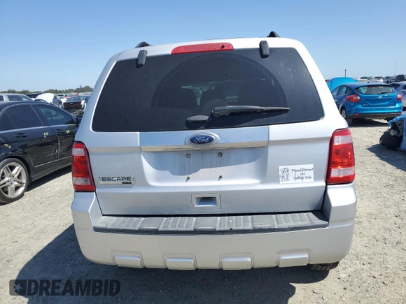 2011 Ford Escape Limited с VIN 1FMCU9E71BKB67398, выставлен на аукционе Copart как лот 58447465 с пробегом 183 208 миль миль и Списание • Salvage title. История ставок и продаж доступна на DreamBid. Изображение 6.