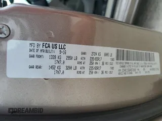 2017 Chrysler Pacifica Touring with VIN 2C4RC1DG6HR572039, listed as a Copart auction lot 58568105 with 190,405 mi miles and Salvage title. Bid and sale history available at DreamBid. Image 14.