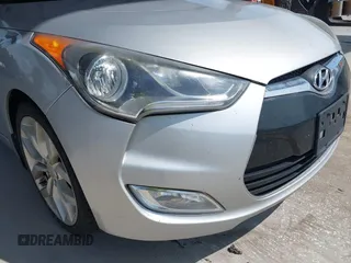 2012 Hyundai Veloster w/Gray Int z VIN KMHTC6ADXCU056898, wystawiony jako IAAI lot #40366687 z przebiegiem 137 161 mil mil oraz . Historia ofert i sprzedaży dostępna na DreamBid. Obrazek 12.