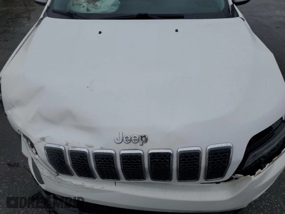 2019 Jeep Cherokee Latitude z VIN 1C4PJLCBXKD332002, wystawiony jako Copart lot #56652185 z przebiegiem 113 690 mil mil oraz Szkoda całkowita • Salvage title. Historia ofert i sprzedaży dostępna na DreamBid. Obrazek 12.