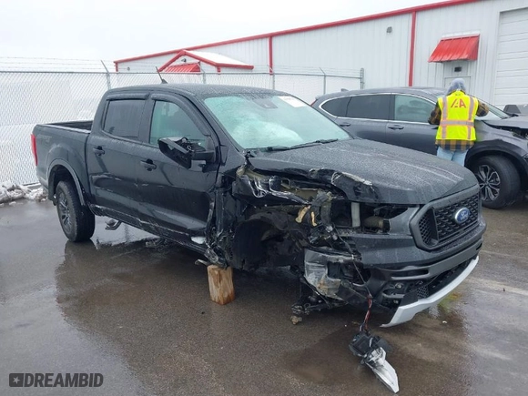 2020 Ford Ranger XL with VIN 1FTER4FH2LLA92828, listed as a IAAI auction lot 41558790 with 64,838 mi miles. Bid and sale history available at carsss.com. Image 1.