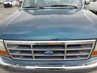 1997 Ford F-350 with VIN 1FTHF36G8VEB56577, listed as a Copart auction lot 84106284 with 126,868 mi miles and Salvage title. Bid and sale history available at DreamBid. Image 13.