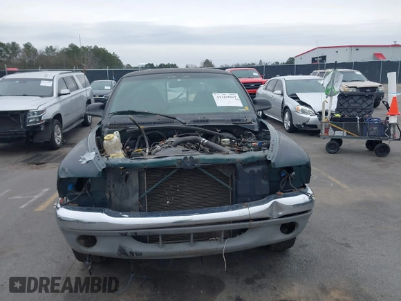 1998 Dodge Dakota SLT with VIN 1B7GL22X1WS615049, listed as a IAAI auction lot 41369967 with 259,598 mi miles and . Bid and sale history available at DreamBid. Image 12.
