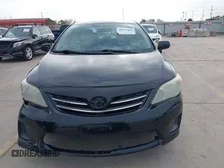 2013 Toyota Corolla L with VIN 5YFBU4EE9DP148748, listed as a IAAI auction lot 40919169 with 102,394 mi miles and . Bid and sale history available at DreamBid. Image 13.