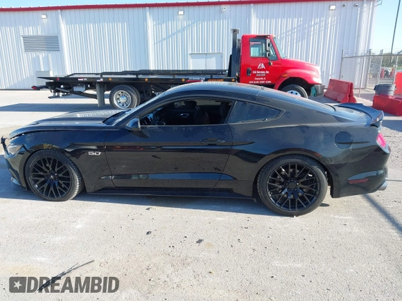 2015 Ford Mustang GT with VIN 1FA6P8CF4F5379607, listed as a IAAI auction lot 42039187 with 75,587 mi miles and . Bid and sale history available at carsss.com. Image 14.