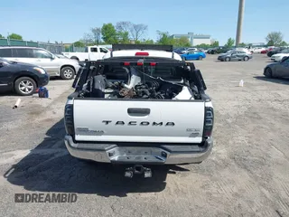 2013 Toyota Tacoma with VIN 3TMLU4EN9DM113137, listed as a IAAI auction lot 41709140 with 57,704 mi miles and . Bid and sale history available at DreamBid. Image 17.